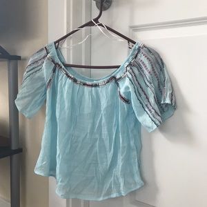 Light blue crop top with flower embroidery